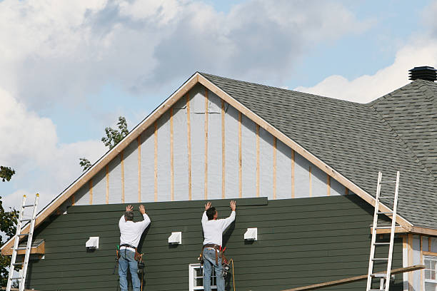Professional Siding Contractor technician working in Revere, MA